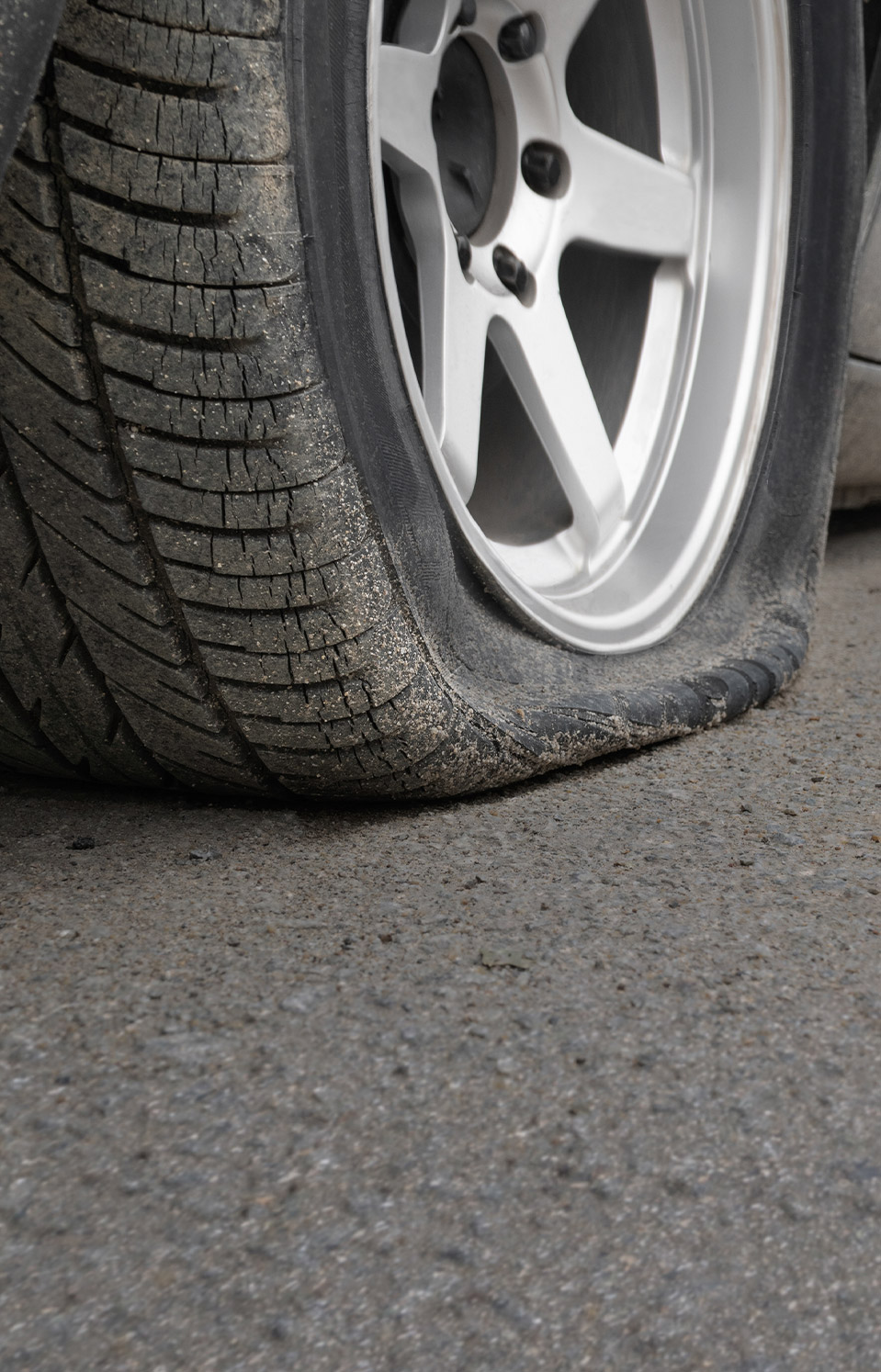 flat tire on pavement